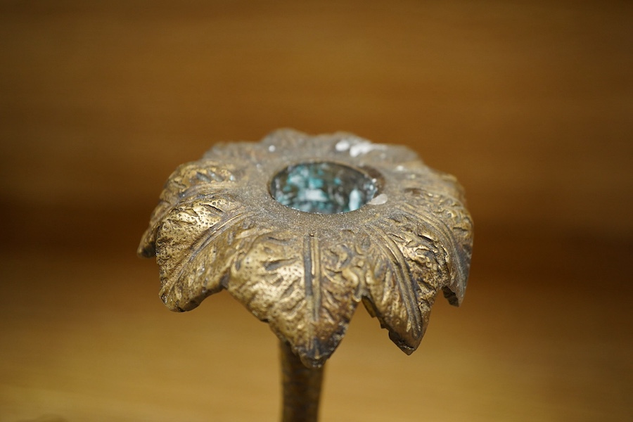 A brass two branch candleholder in the form of palm trees and monkeys, 22cm high. Condition - fair